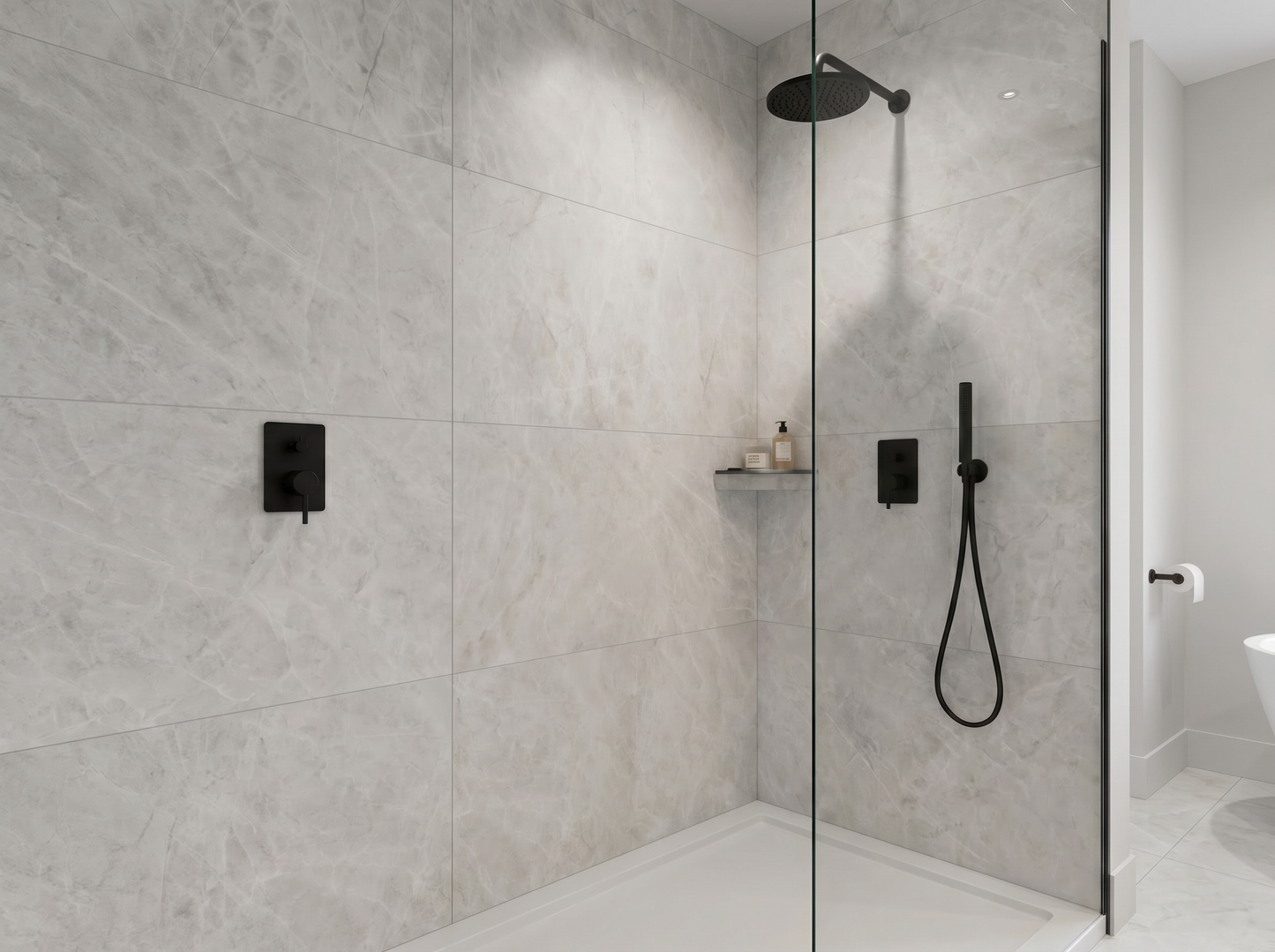 Modern shower setup with black fixtures in a tiled bathroom.